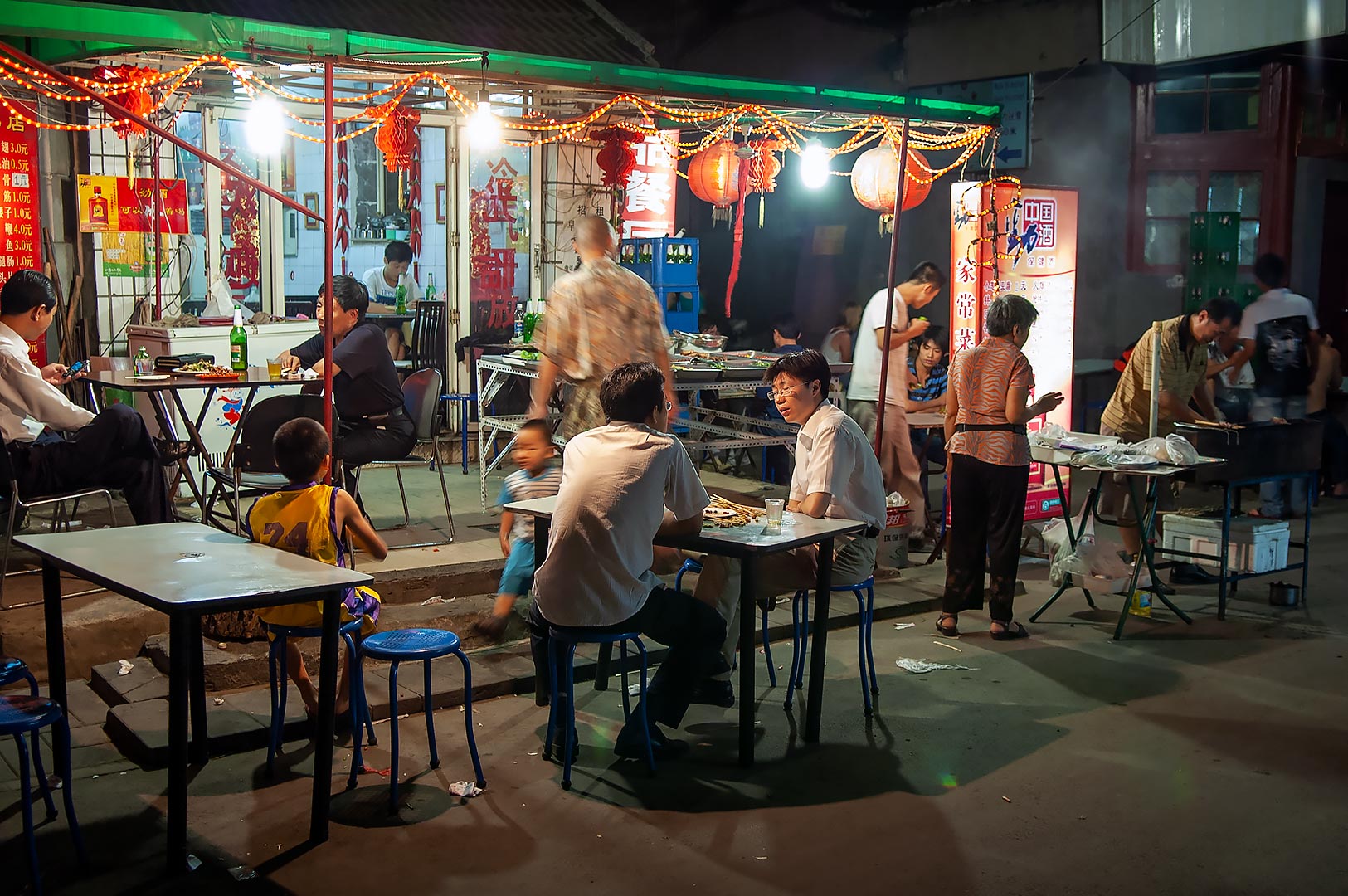 Gatuserveringar i de gamla hutongerna i Beijing