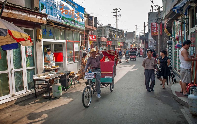Cykeltransport längs Hutongerna i Beijing