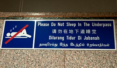 Do not sleep in the underpass, sign, Singapore