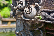 Detalj på stendekoration på tempelbyggnad, Pura Tirtha Empul, Bali