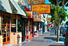 Trottoar längs butiker i Mission District, San Francisco
